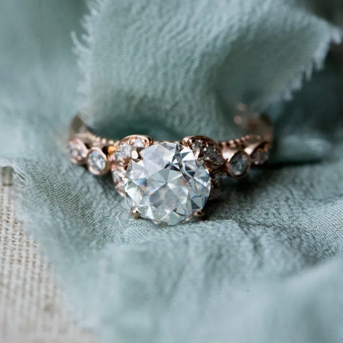 8mm Round OEC Heirloom Moissanite 14K Rose Gold Half Bead Shank and Diamond Bezel Side Ring Fire Brilliance Rings