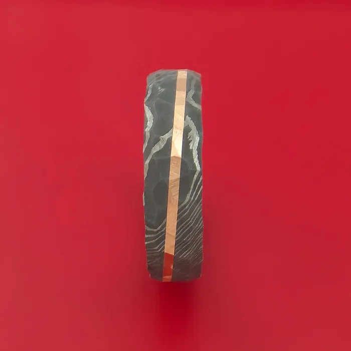 Damascus Steel Rock Hammered Ring with Angled 14k Rose Gold Inlay Custom Band Lashbrook Rings Damascus Steel Rock Hammered Ring with Angled 14k Rose Gold Inlay Custom Band Lashbrook Rings