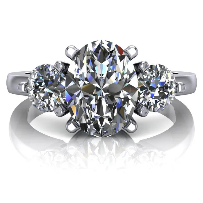 Fire Brilliance Rings Giselle Oval Center Stone Trinity Under Bezel Engagement Ring
