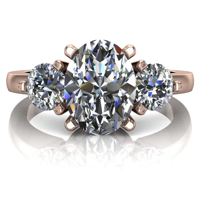 Fire Brilliance Rings Giselle Oval Center Stone Trinity Under Bezel Engagement Ring