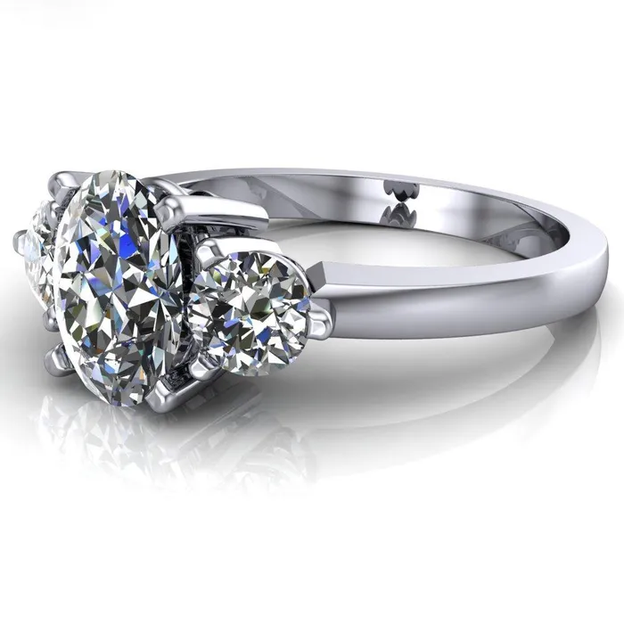 Fire Brilliance Rings Giselle Oval Center Stone Trinity Under Bezel Engagement Ring