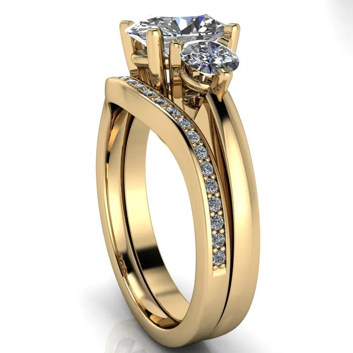 Fire Brilliance Rings Giselle Oval Center Stone Trinity Under Bezel Engagement Ring