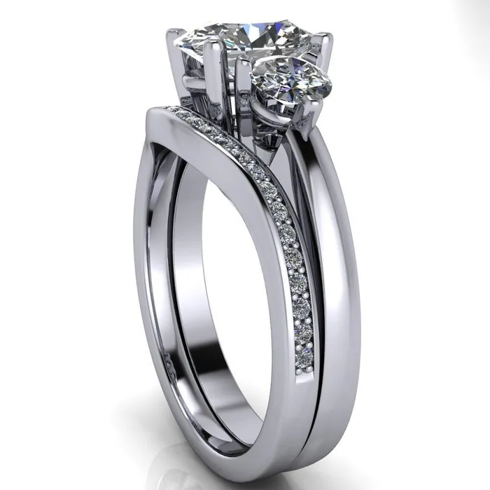 Fire Brilliance Rings Giselle Oval Center Stone Trinity Under Bezel Engagement Ring
