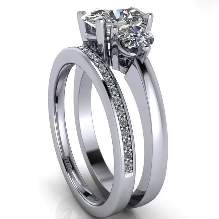 Fire Brilliance Rings Giselle Oval Center Stone Trinity Under Bezel Engagement Ring