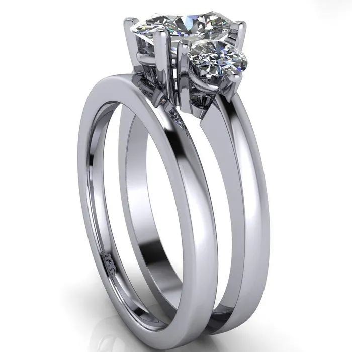 Fire Brilliance Rings Giselle Oval Center Stone Trinity Under Bezel Engagement Ring