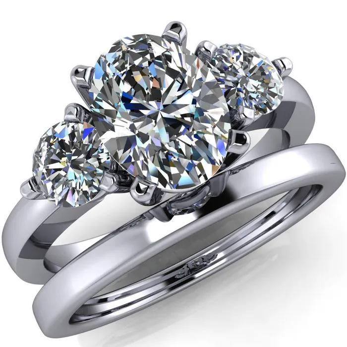 Fire Brilliance Rings Giselle Oval Center Stone Trinity Under Bezel Engagement Ring
