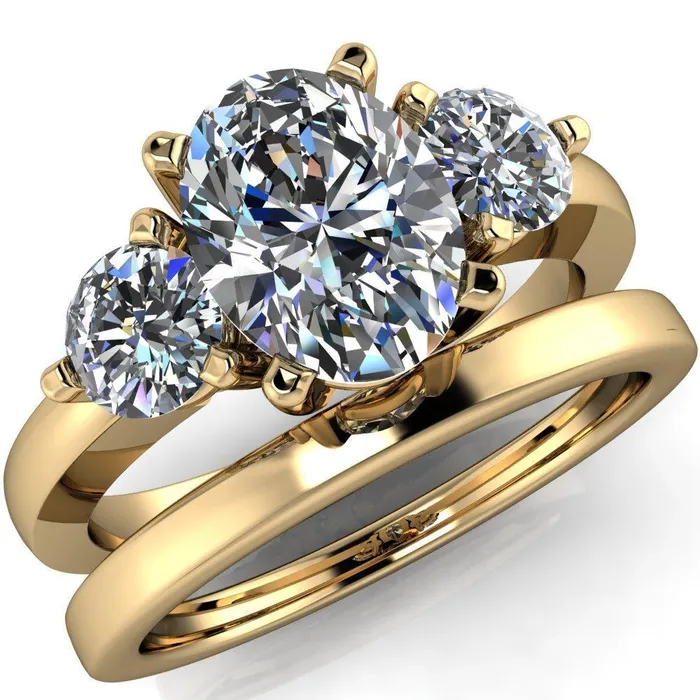 Fire Brilliance Rings Giselle Oval Center Stone Trinity Under Bezel Engagement Ring