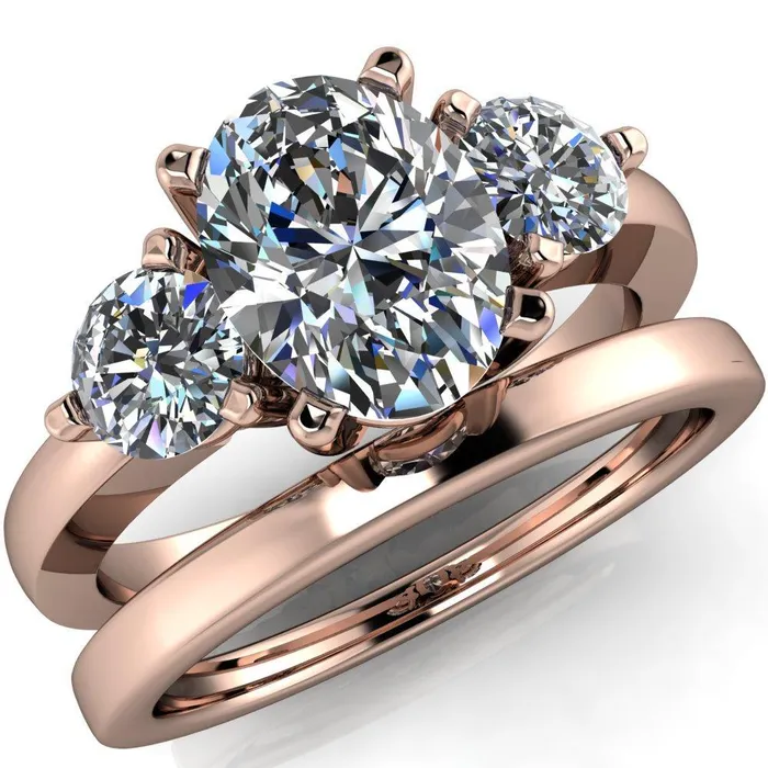 Fire Brilliance Rings Giselle Oval Center Stone Trinity Under Bezel Engagement Ring
