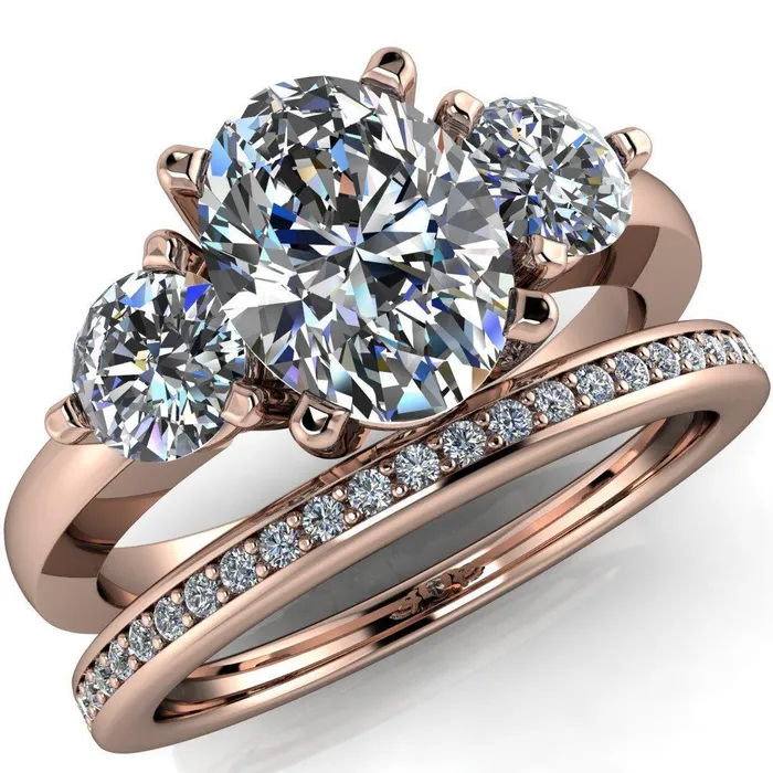 Fire Brilliance Rings Giselle Oval Center Stone Trinity Under Bezel Engagement Ring