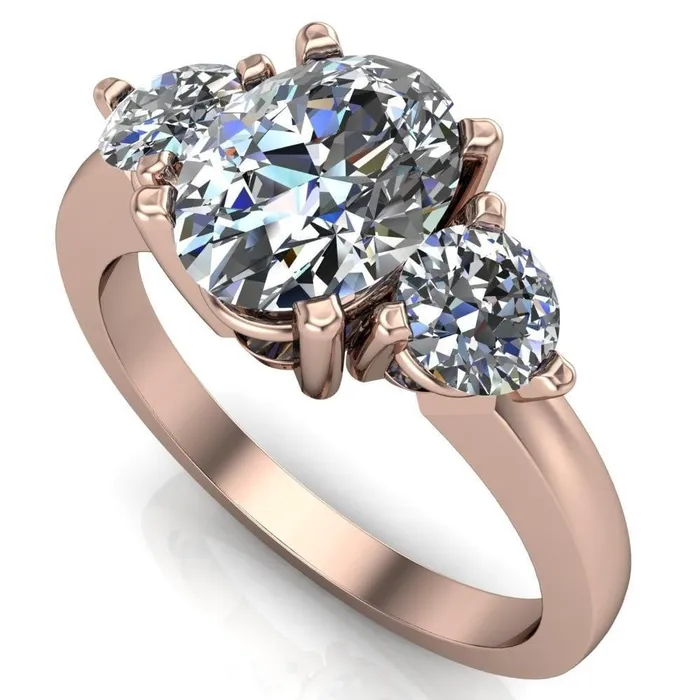 Fire Brilliance Rings Giselle Oval Center Stone Trinity Under Bezel Engagement Ring