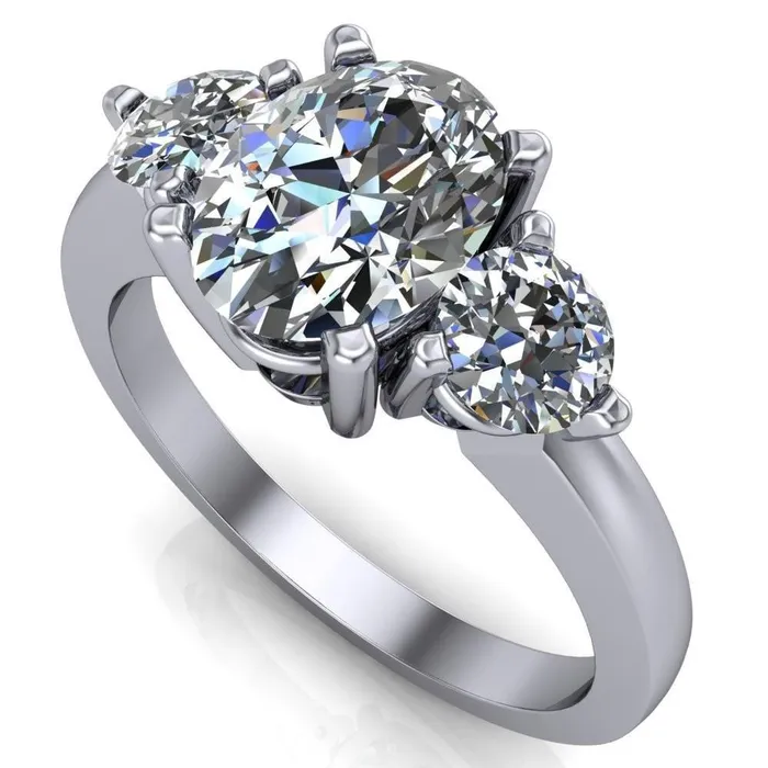 Fire Brilliance Rings Giselle Oval Center Stone Trinity Under Bezel Engagement Ring
