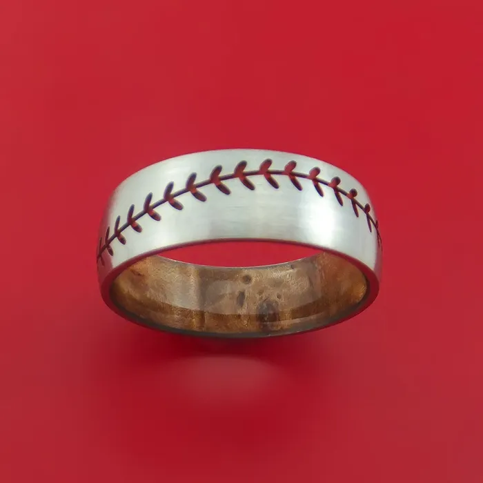 Lashbrook Rings Titanium Ring with Baseball Stitching and Cerakote Inlays and Interior Hardwood Sleeve Custom Made Band Lashbrook Rings Titanium Ring with Baseball Stitching and Cerakote Inlays and Interior Hardwood Sleeve Custom Made Band