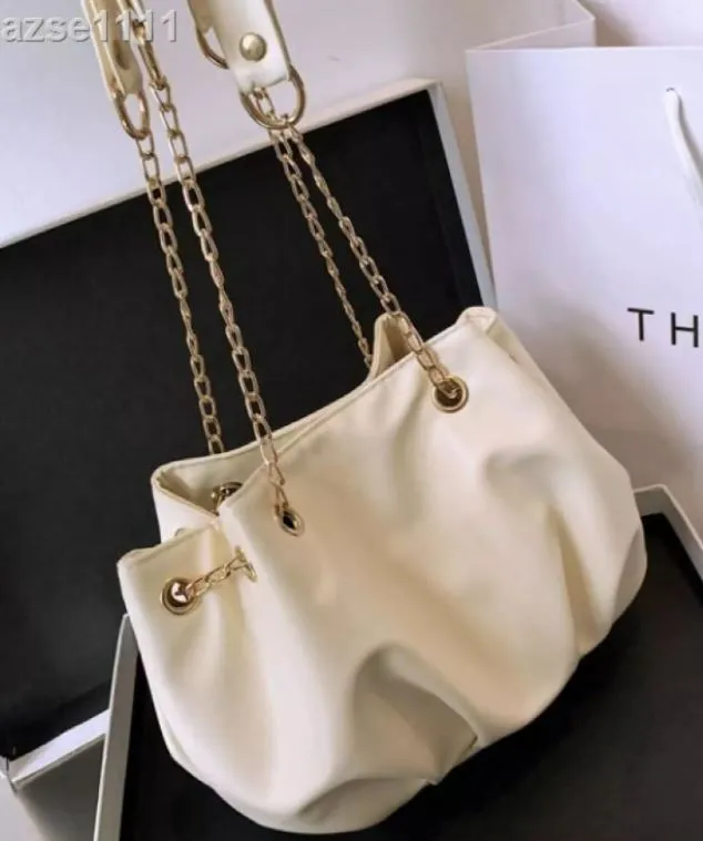 polly Necklaces PB179 Ivory Gold Chain Purse
