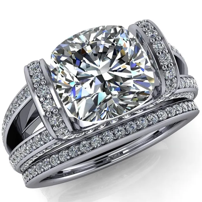 Rings Fire Brilliance Harlow Cushion Center Stone Half Bezel Split Shank Diamond Channel Cathedral Ring Rings Fire Brilliance Harlow Cushion Center Stone Half Bezel Split Shank Diamond Channel Cathedral Ring