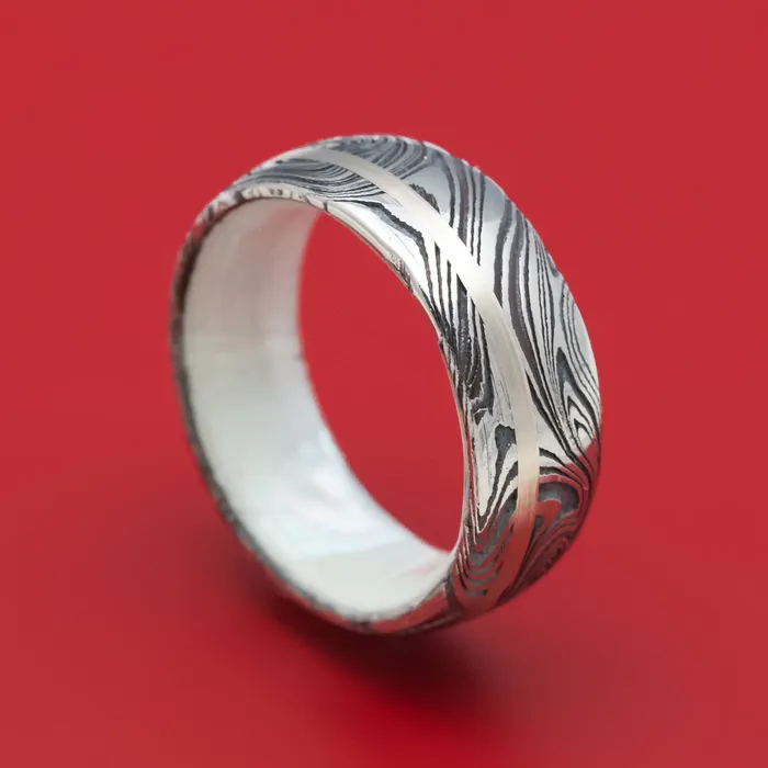 Rings Lashbrook Marble Damascus Steel Ring with White Mother of Pearl Sleeve and Gold Inlay Custom Made Band Rings Lashbrook Marble Damascus Steel Ring with White Mother of Pearl Sleeve and Gold Inlay Custom Made Band